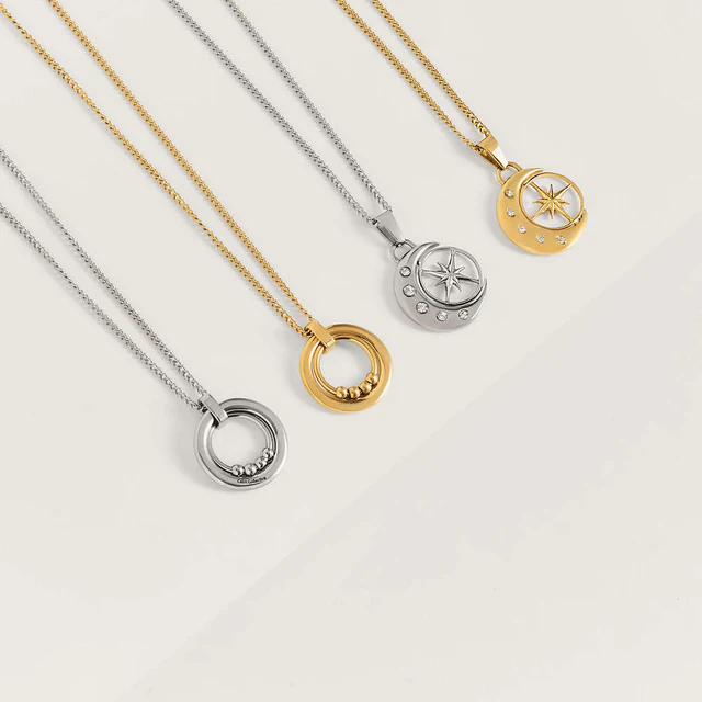 Two silver and Two gold necklaces lined up